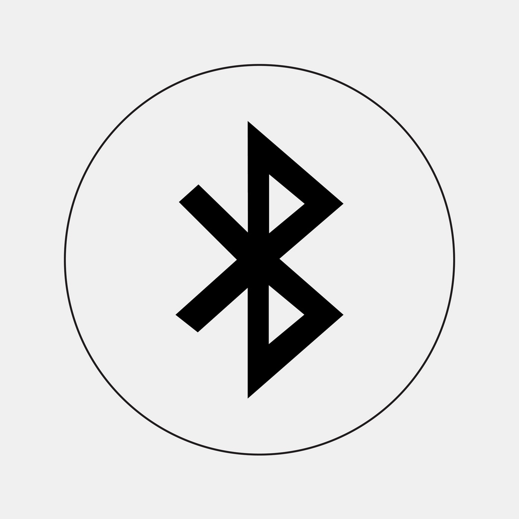  A simple black Bluetooth symbol, consisting of a combination of runic letters, enclosed within a thin black circle on a light gray background.